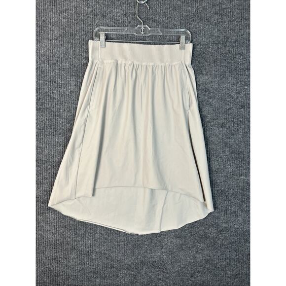 Athleta Womens Cosmic Skirt Medium Tan Stretch Performance Pockets Golf Tennis - Picture 1 of 7